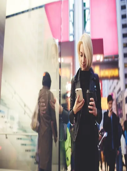 Woman looking at her phone image