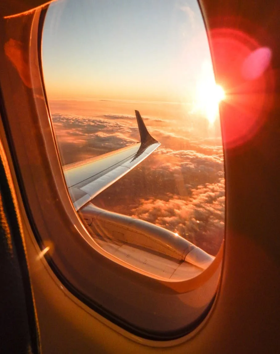 Traveler sunset in plane